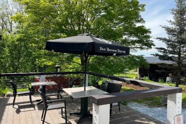 patio with umbrella and table and chairs